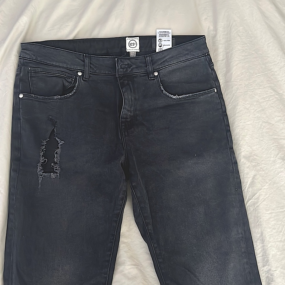 Men’s black slim distressed jeans